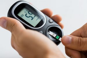 Checking Blood Sugar Level - Greenville Health Care